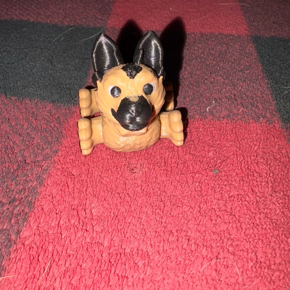 Tan and Black Dog Figurine